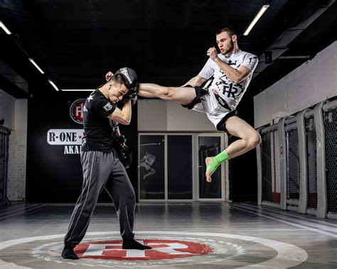 man practising kicking  stock photo