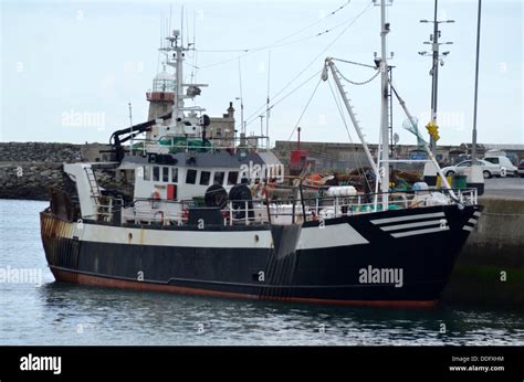 fishing boat is located in port Stock Photo - Alamy