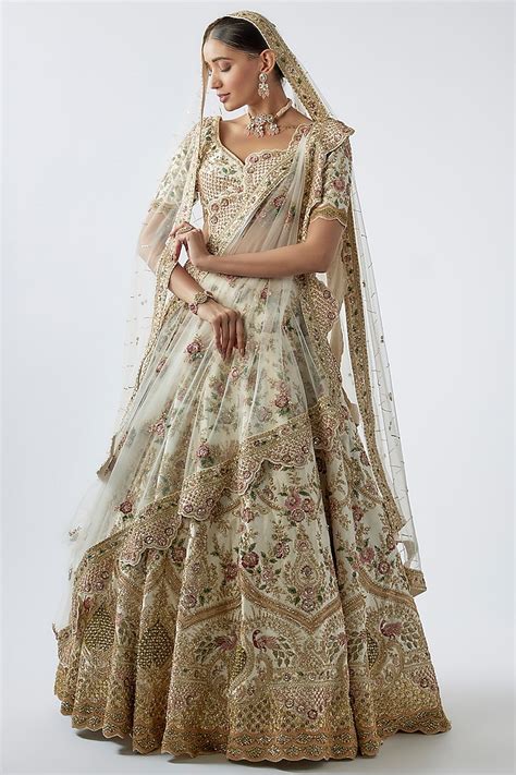 Ivory Raw Silk Embellished Bridal Lehenga Set By Kalighata At Pernias