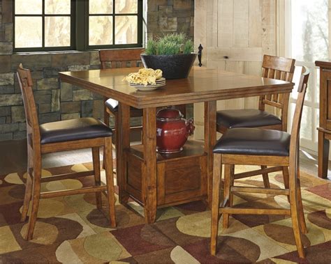 Ralene Medium Brown Pub Table W Leaf And 4 Stools By Signature Design