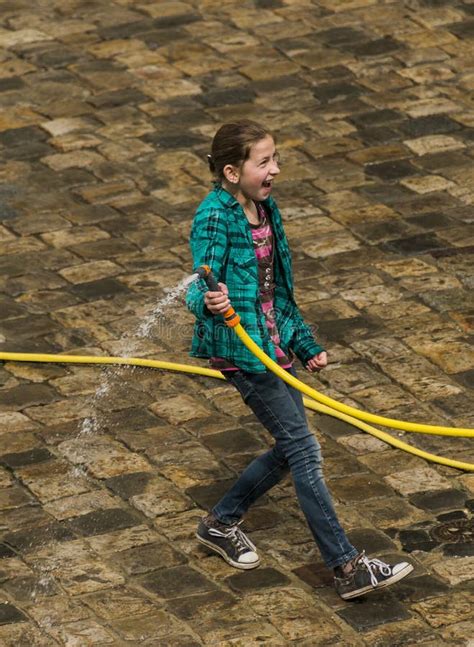 Happy Girl Pouring Water On Each Other Editorial Image Image Of