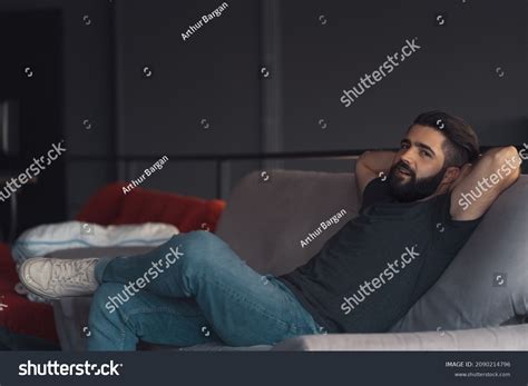 young attractive guy sitting relaxing  stock photo