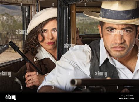 Tough 1920s gangster male and female partners Stock Photo - Alamy