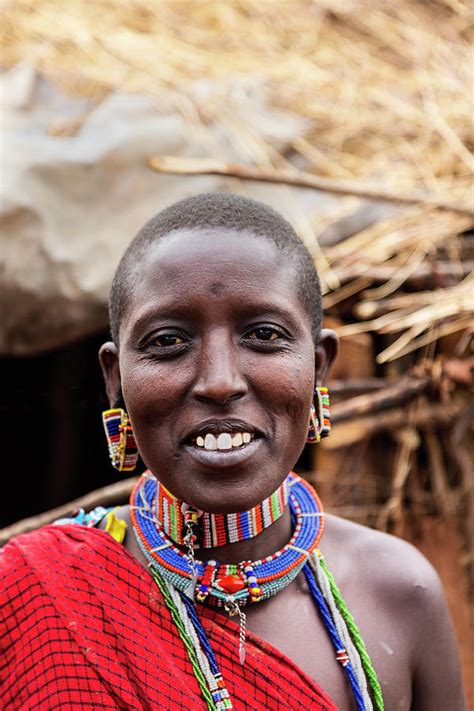 Portrait Of Maasai Woman In Traditional by Brittak