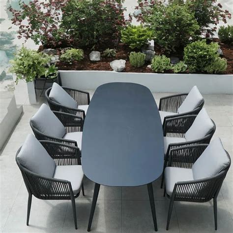 Corrigan Studio Arnbiorn Oval 6 Person Outdoor Dining Set With