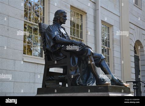 The famous John Harvard statue in Harvard Yard at Harvard University in ...