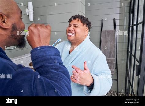 Gay Couple Brushing Teeth Stock Photo Alamy