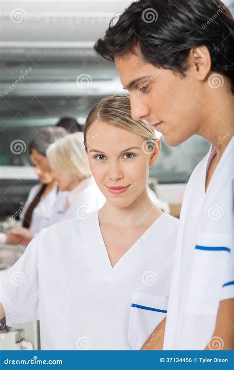 Confident Researcher With Colleague Stock Photo Image Of Medicine