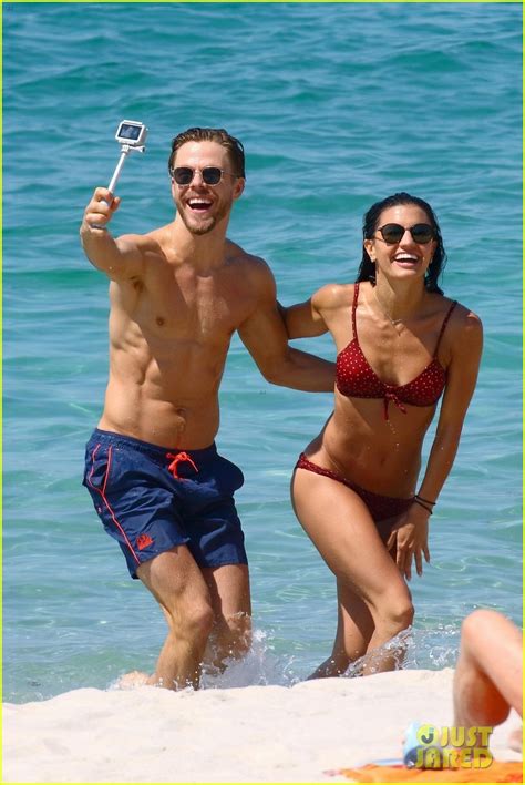 Shirtless Derek Hough Hits The Beach With Girlfriend Hayley Erbert In