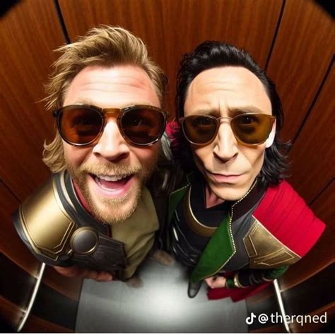 Two Men Dressed As Thor And Loki From The Avengers Movie Posing For A