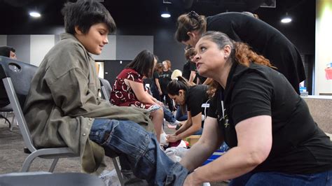 Las Cruces church gives away new shoes to 136 students