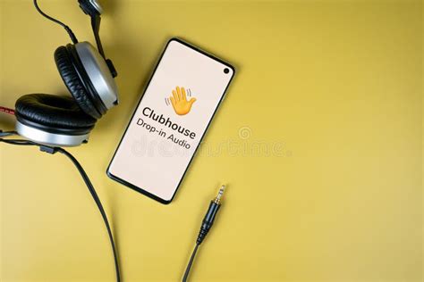 Clubhouse App Logo on a Smartphone Screen with Headphones Editorial ...