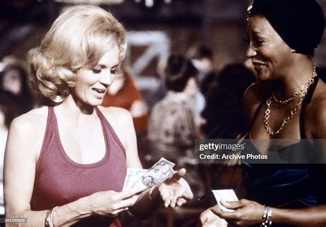 Angie Dickinson Holds Money In A Scene From The Tv Series Police News Photo Getty Images