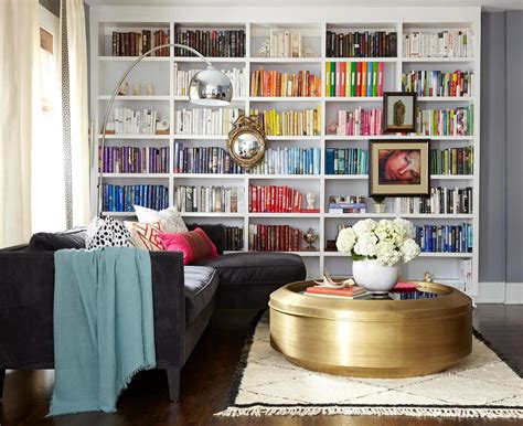 Expert Tips On Styling A Shelf With Lots Of Books