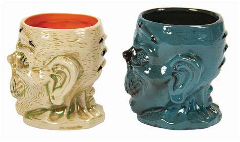 Pair of Trader Sam's Enchanted Tiki Bar Zombie Mugs.