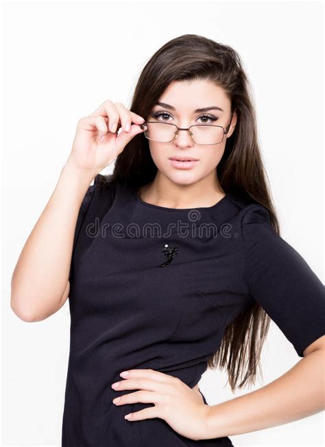 Portrait Of Beautiful Business Woman In Blue Dress Wearing Glasses