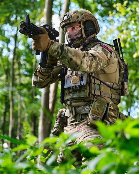 A Royal Marines Commando from Alpha Company 40 Commando dons Future Commando Force kit including ...