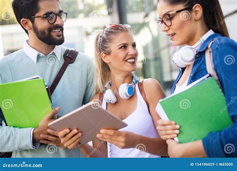 Group Of Friends Studying Together At University Campus Stock Image