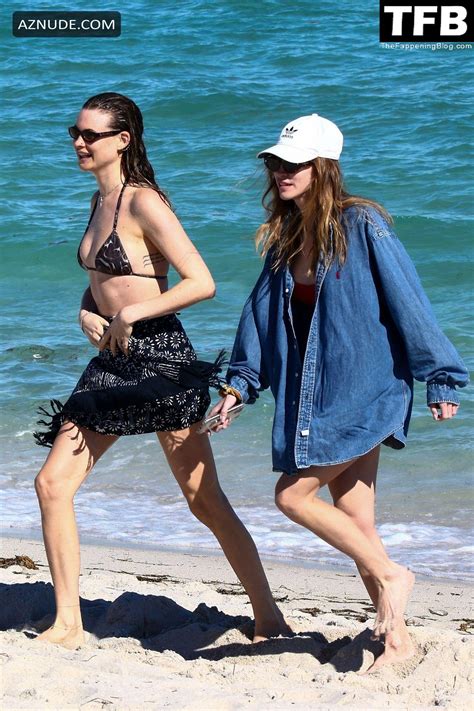 Behati Prinsloo Wears A Cheeky Black Bikini On The Beach In In Miami