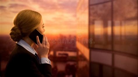 Female Calling Travel Agency Booking Business Trip Enjoying Sunset