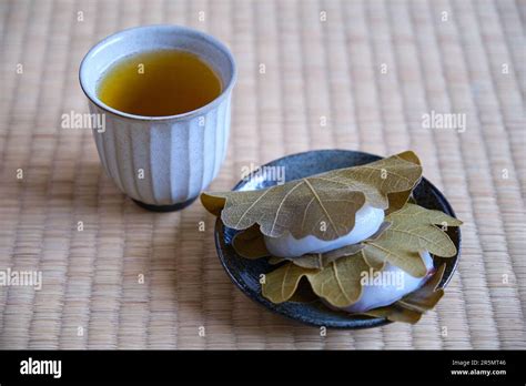 Japanese Kashiwa Mochi And Green Tea On Tatami Stock Photo Alamy