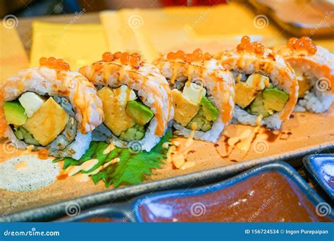 Salmon Cheese California Roll Topping With Cheese And Avocado Shoyu Soy Sauce And Salmon Eggs