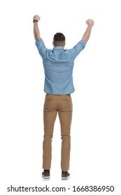 Back View Of A Casual Man Celebrating Success Images Stock Photos