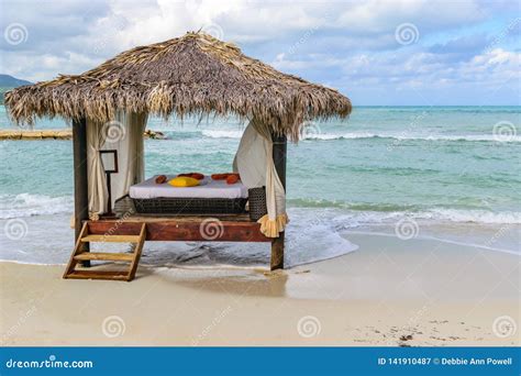 Thatch Roof Hut Massage Bed On Tropical Island White Sand Beach Royalty