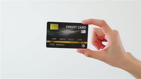 Hand Holding Credit Card 2216171 Stock Video at Vecteezy