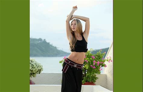 Anjelica Ebbi Black Top And Long Skirt Blonde Headland Flowers Balcony Belt Lake Belly