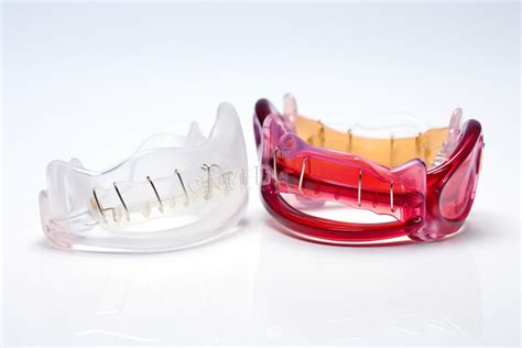 Orthodontic Appliances On A White Background Health Management Orthodontics Background Image