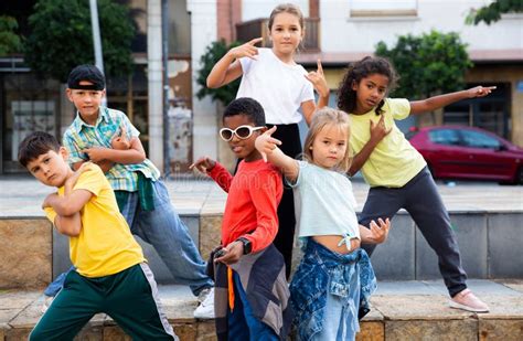 Tweens Dancing in Circle with Coach Stock Photo - Image of group ...