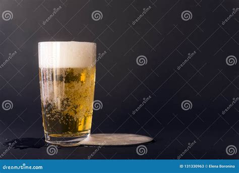 Light Beer In A Glass On A Black Background Alcoholic Drink Stock