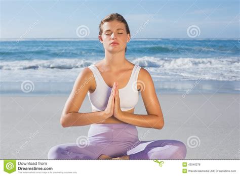 Sporty Blonde Sitting In Lotus Pose On The Beach Stock Photo Image Of