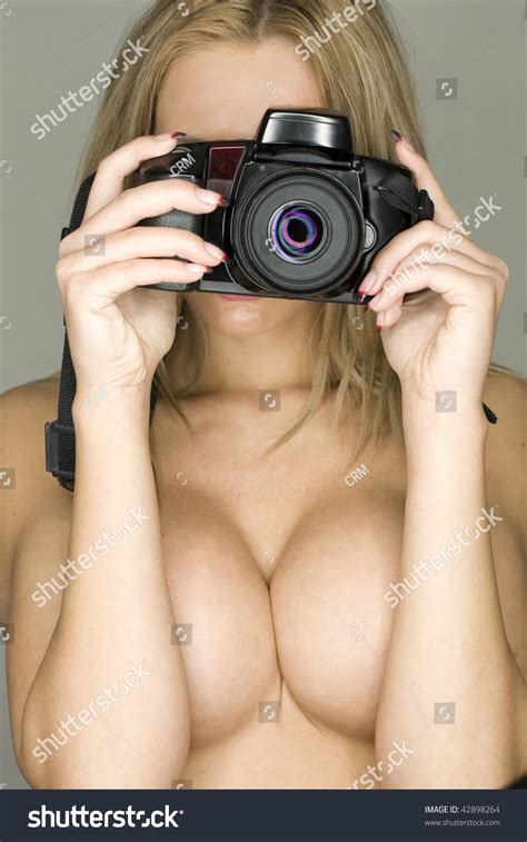 Sexy Naked Female Photographer With Slr Camera Stock Photo