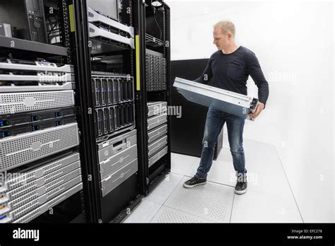 It Consultant Install Rack Server In Datacenter Stock Photo Alamy