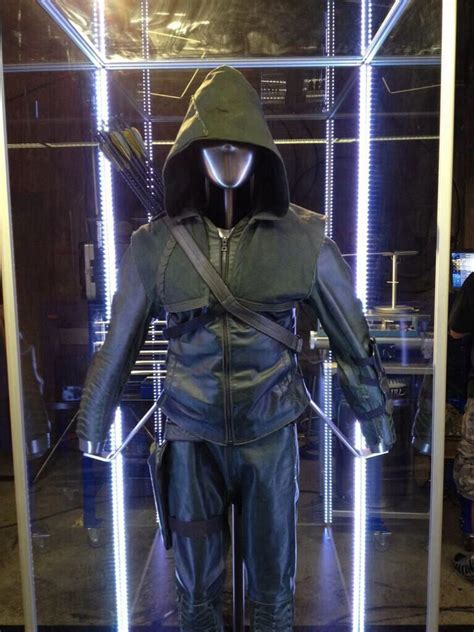 A Display Case With A Leather Suit And Hood