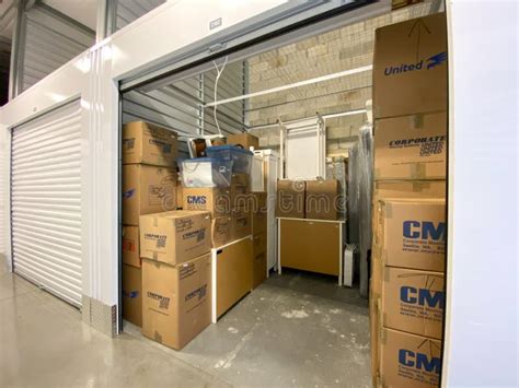 An Interior of a Storage Space Unit Displaying the Boxes at Extra Space ...