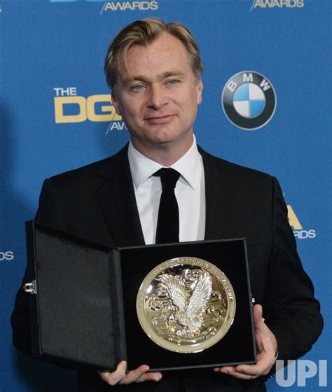 Photo: Christopher Nolan appears backstage at the 70th annual Directors ...