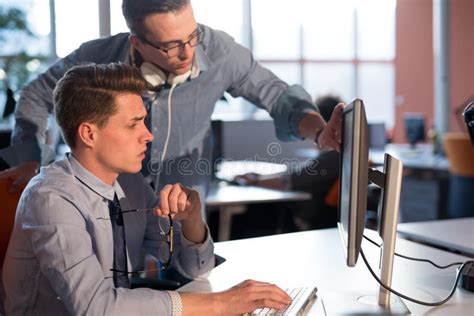 Two Business People Working With Computer In Office Stock Photo Image