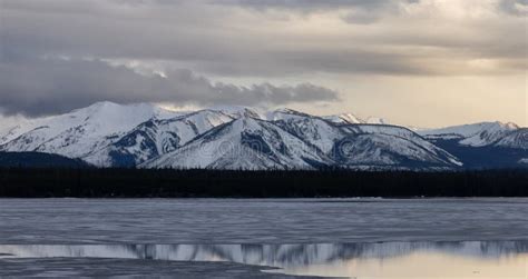 Yellowstone Lake with Snow Covered Mountains in American Landscape ...