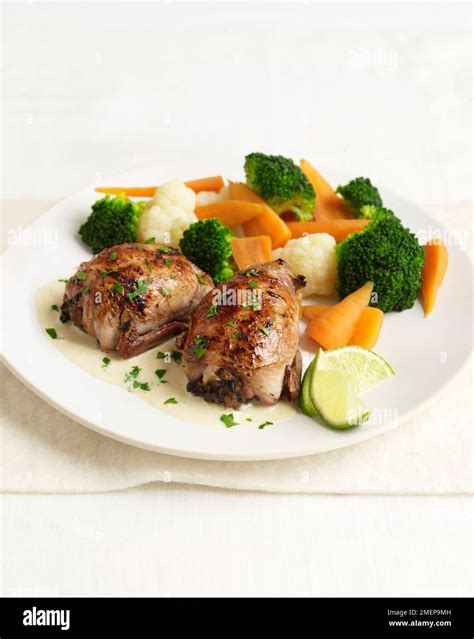 Mushroom Quail With Carrots Broccoli And Cauliflower Stock Photo Alamy