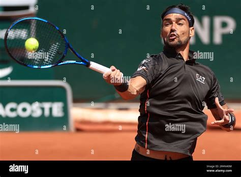 Italy S Fabio Fognini Plays A Shot Against Canada S Felix Auger