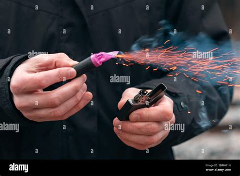 The Firecracker In A Hand Man Holding A Burning Petard In His Hand A