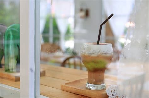 Iced Coffee With Milk On Wooden Table At Cafe Stock Photo Image Of