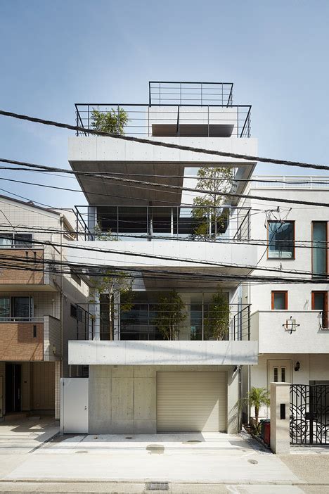 Four Storey House With Tree Lined Balconies By Ryo Matsui Architects