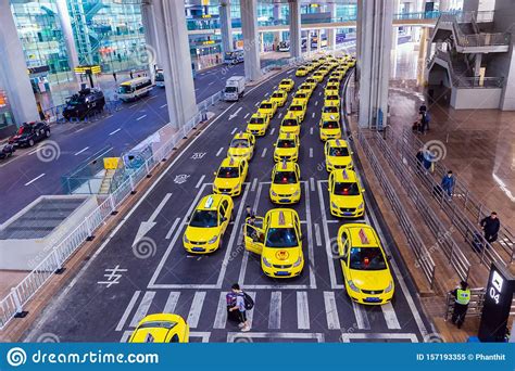 Group Of Yellow Taxi Cabs Waiting Arrival Passengers In Front Of Airport Gate Chongqing