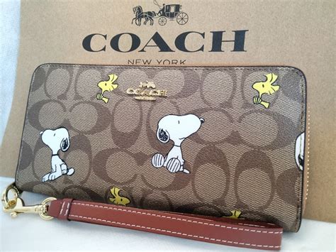 【未使用】1円スタート【新品未使用】coach コーチ スヌーピー コラボ ウッドストック 長財布 Snoopy ラウンドファスナーの落札情報