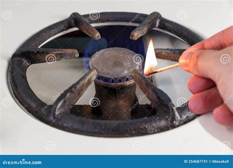 A Man Lighting a Gas Stove with a Match Stock Image - Image of fire ...