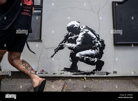 A Person Walks Past Graffiti Artwork At The Upfest Presents Cultural